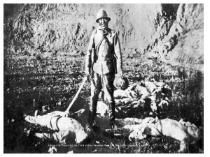 Japanese soldier with Chinese corpses